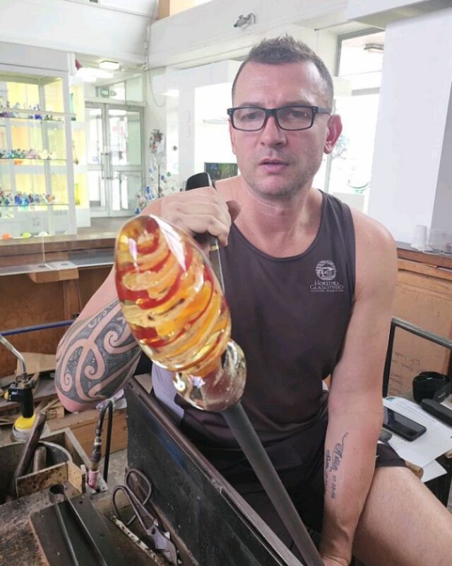 Gene is working on our memorial orders today...sooooo many to make!! This piece of gorgeousness will be lime green & emerald green when it comes out of the oven!!!

#lovehokitika #GLASSBLOWING #handmadedrinkingglasses #nzglassblowers #buynzmade #familybusiness #supportlocal #memorialglass